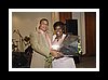 Alma Betancourt receiving her birthday bouquet from Pepe.jpg