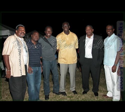 Music lovers take in the steelband concert at MOP 2008.  They include - left to right -  Carl “The Panman”  Richards, David Rudder, Antigua & Barbuda Prime Minister  Baldwin Spencer, Tourism Minster Harold Lovell, and others