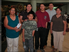 Navajo Language Director/Teacher Clara Morris, left; pan player Jua-Keene (in red), with other members of the Navajo Nation
