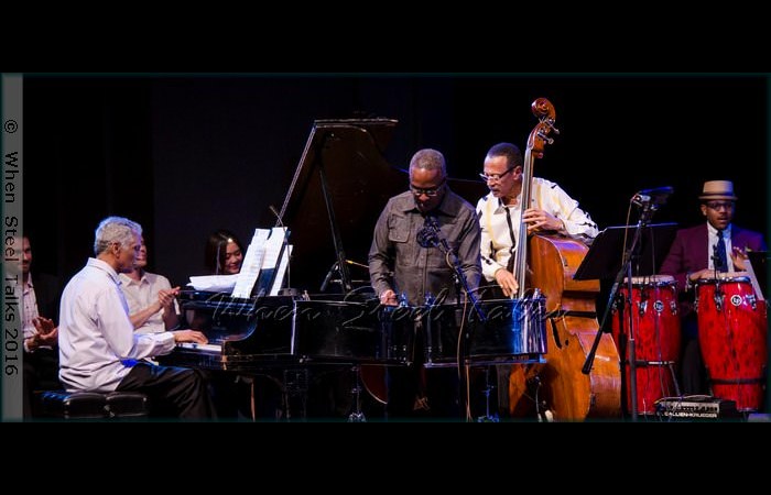 Frankie McIntosh, Garvin Blake, bassist David “Happy” Williams and Étienne Charles on congas
