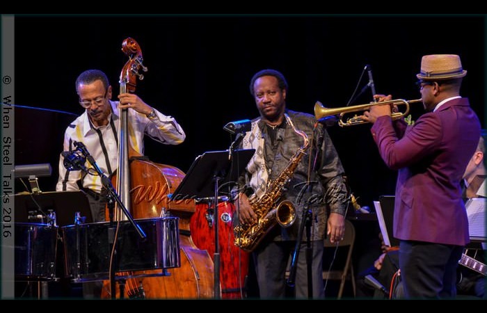 Bassist David “Happy” Williams, saxophonist Charles Daugherty and Étienne Charles