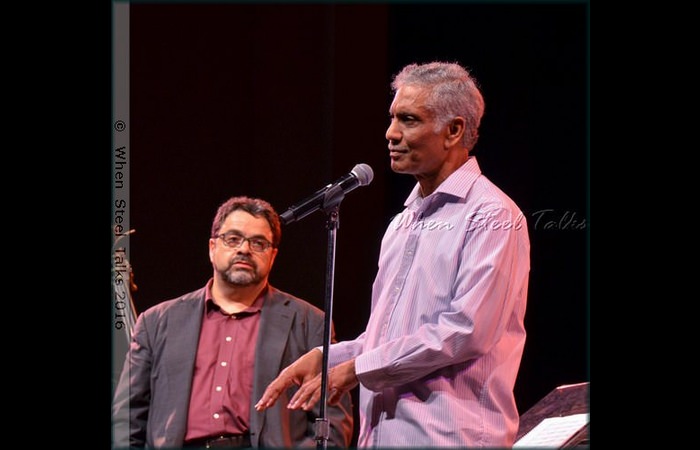 Frankie McIntosh addresses the audience as band leader Arturo O’Farrill