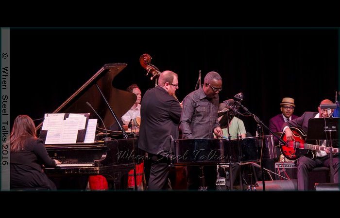 Panist Garvin Blake and Étienne Charles (on congas) perform with the Brooklyn College Big Band