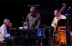 Frankie McIntosh, Garvin Blake, and bassist David “Happy” Williams perform at Brooklyn College