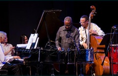 Frankie McIntosh, Garvin Blake, bassist David “Happy” Williams and Étienne Charles on congas