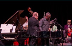 Panist Garvin Blake and Étienne Charles (on congas) perform with the Brooklyn College Big Band