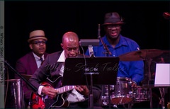 Étienne Charles on congas with the Brooklyn College Big Band