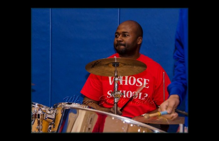 Musical director of Meyer Levin Steel Orchestra, Tichard Chapman, on drums with the band