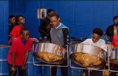 Meyer Levin Steel Orchestra performs and entertains before the start of the meeting