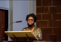 Jeannette King delivering one of the readings at the service