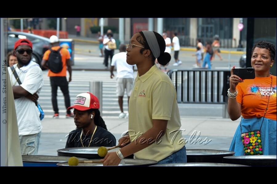 Eruption Steel Orchestra steelpan musician on six-bass