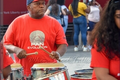 Percussionist Lenny King on congas with Pan Evolution Steel Orchestra