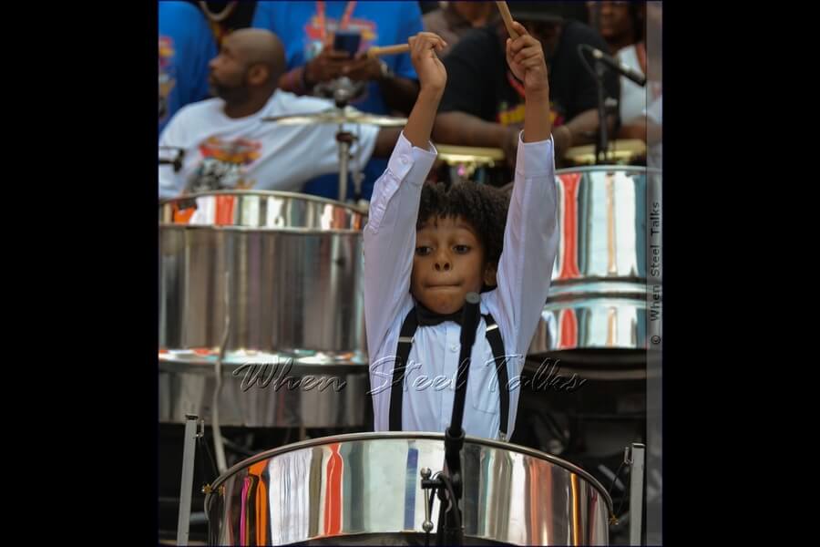 Seven-year-old steelpan musician Sir Halo Maximin performs at Pan in Times Square IV