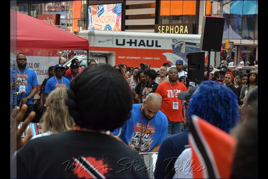 Tristan Japsi (center in image) performs both the anthems of the United States of America and Trinidad and Tobago
