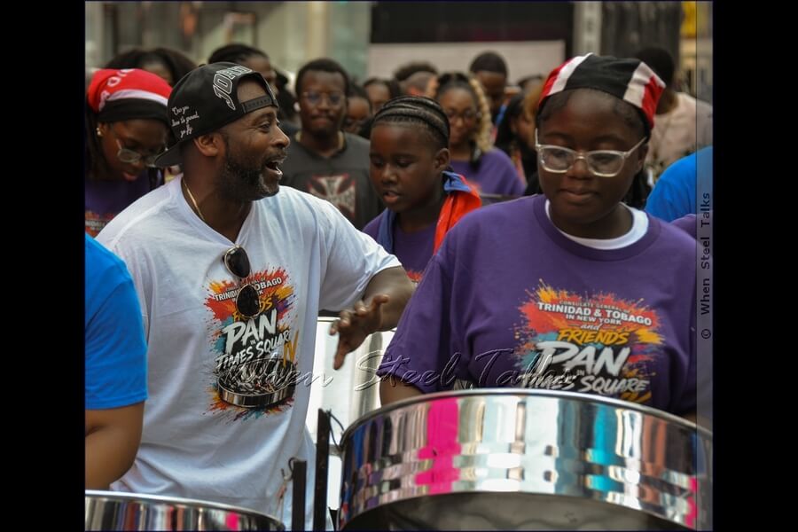 Wayne Bernard,  in white - leader of Pan Evolution Steel Orchestra