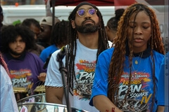 Multitalented musician Khuent Rose, in glasses - director of PULSE Steel Band