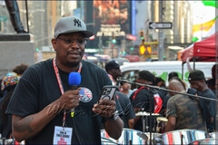 Charles Guy, President of the United States Steelband Association (USSA), addresses the audience
