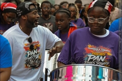 Wayne Bernard,  in white - leader of Pan Evolution Steel Orchestra