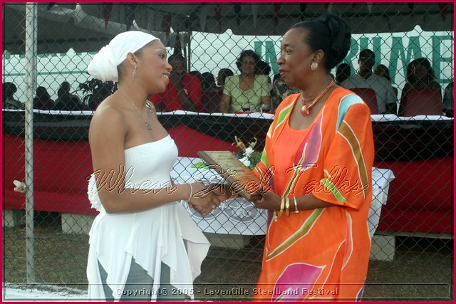 Culture Minister Joan Yuille-Williams (right) presents Destra Garcia with her award..jpg