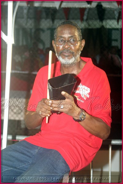 Former Pan Trinbago president Owen Serrette keeps a timing with his band Solo Pan Knights.jpg