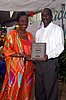 Culture Minister Joan Yuille-Williams presents Eloy Burge with his award for Community Service.jpg