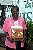 Former National netballer Enid Brown displays her award for Community Service.jpg