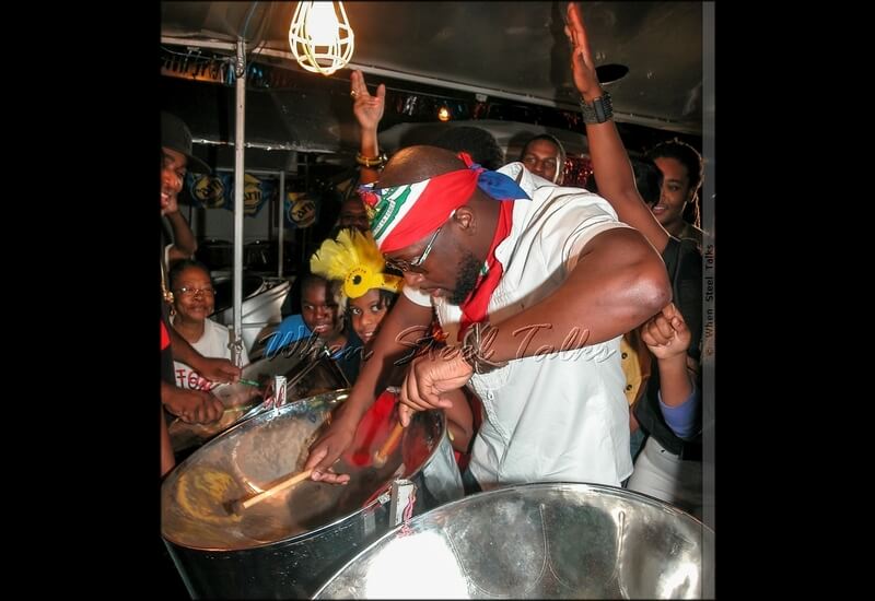 Wyclef Jean on pan during his photoshoot with Pantonic Steel Orchestra