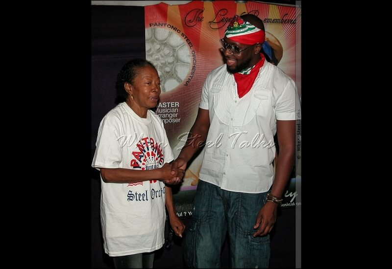 President of Pantonic Steel Orchestra Glenda Gamory with Wyclef Jean after the photoshoot