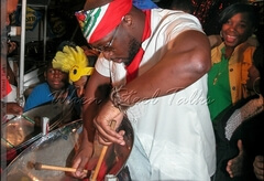 Wyclef Jean on pan during his photoshoot with Pantonic Steel Orchestra
