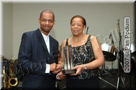 T&T High Commissioner presents Hall of Fame to Toussaint Clarke for Earl Rodney.jpg