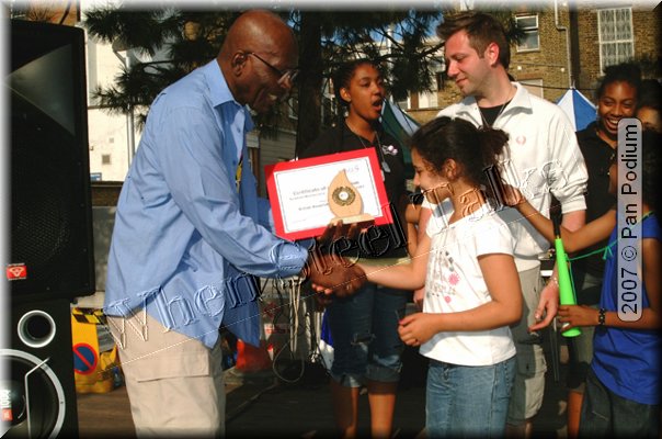 Gerald presenting BAS Award to Haringey Young Musicians.jpg