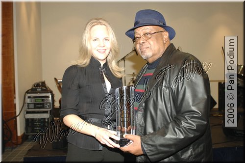 Ebony receiving their National Panorama award from Ashtom Tiger Moore.jpg
