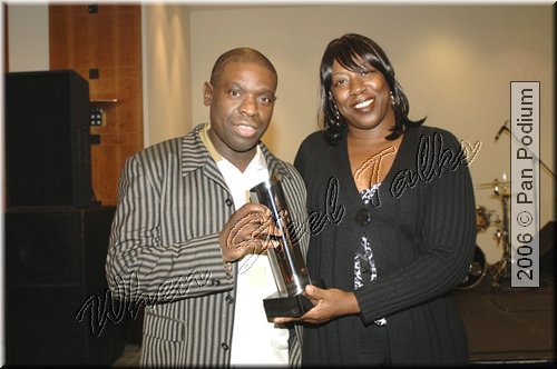 Princess Rollock London All Stars receiving the Jouvert Bomb Award from Eversley.jpg