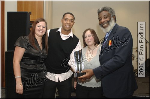 Real Steel receiving their 15th anniversary award from Clyde Bacchusm.jpg