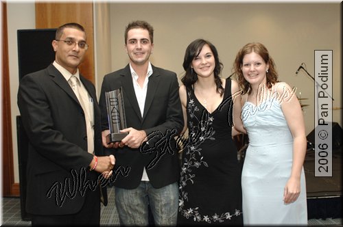 Sounds of Steel receiving their 10th anniversary award from Robbie Joseph.jpg